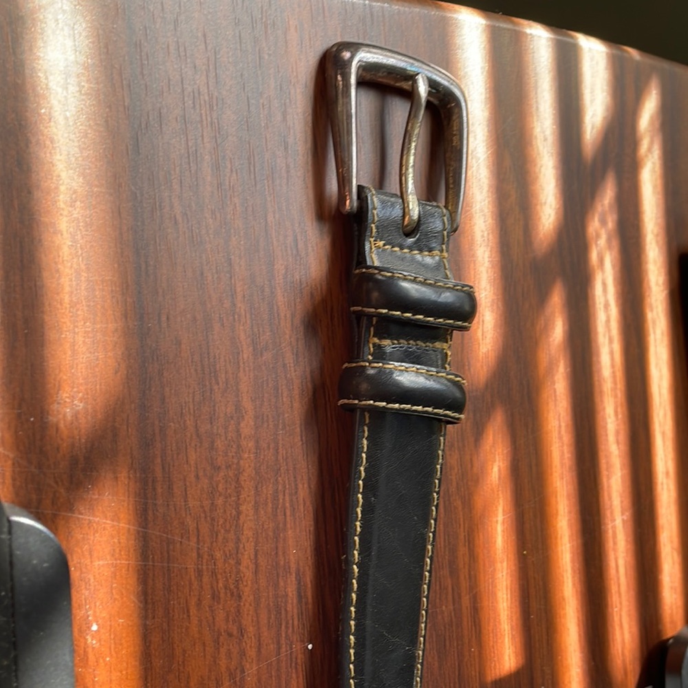 Mens black leather belt with silver buckle. Size 36